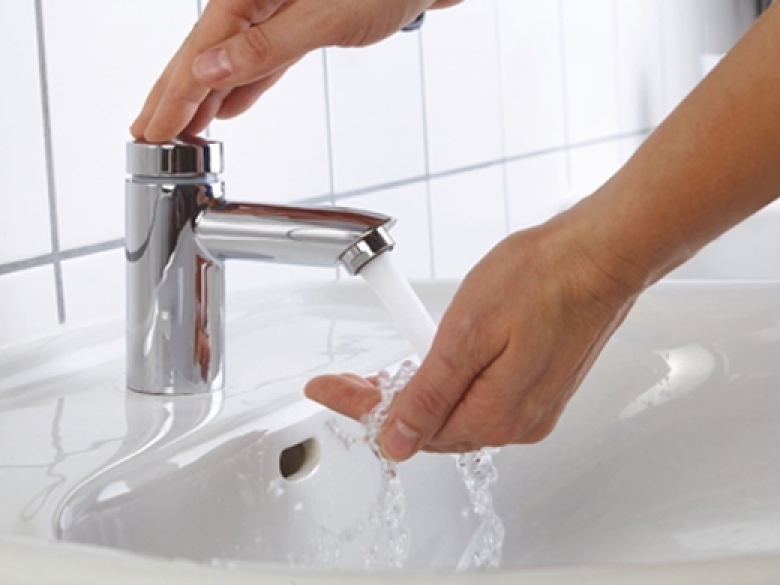 Robinet de lavabo à fermeture temporisée